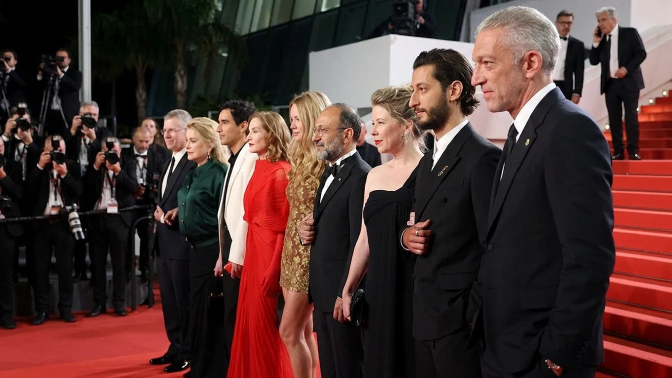 (L-R) Alexandre Mallet-Guy, Catherine Deneuve, Adam Bessa, Isabelle Huppert, Virginie Efira, Asghar Farhadi, India Hair, Pierre Niney and Vincent Cassel attend the Histoires Parallèles (Parallel Tales) screening during the 79th annual Cannes Film Festival at Palais des Festivals on May 14, 2026 in Cannes, France.