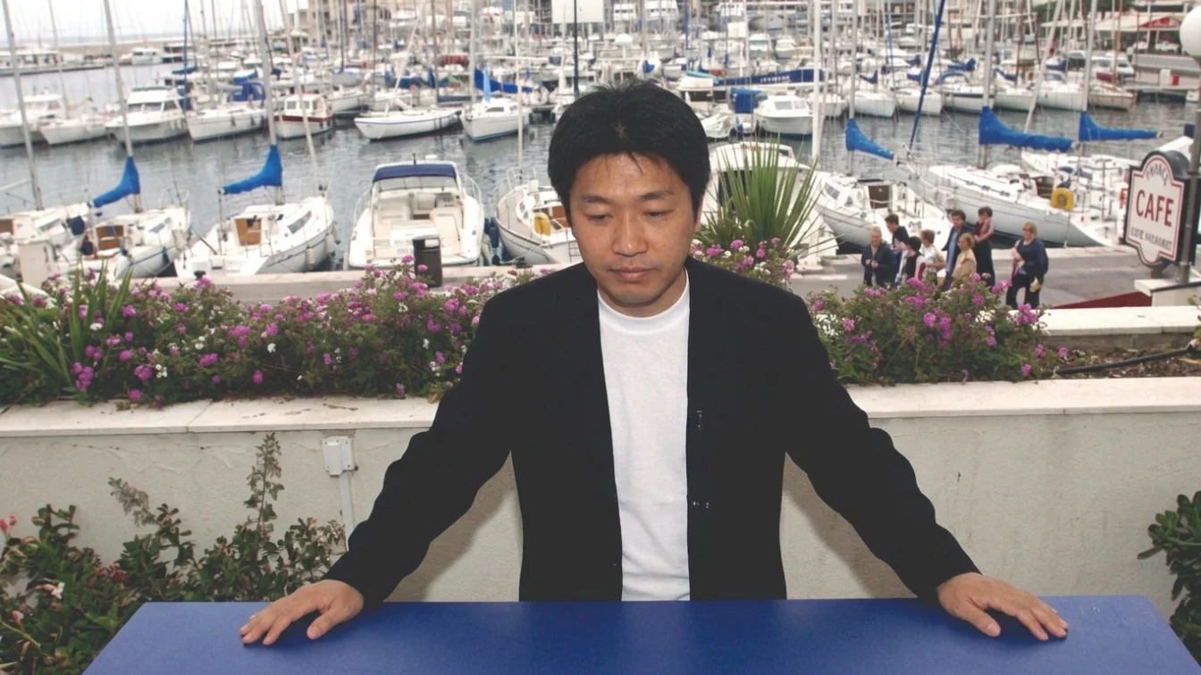 Japanese director Hirokazu Kore-Eda poses during the photocall of his film, "Distance," at the Palais des Festival in Cannes 10 May 2001. "Distance" is presented in competition for the 54th Cannes Film Festival. (Photo by Anne-Christine POUJOULAT / AFP)
