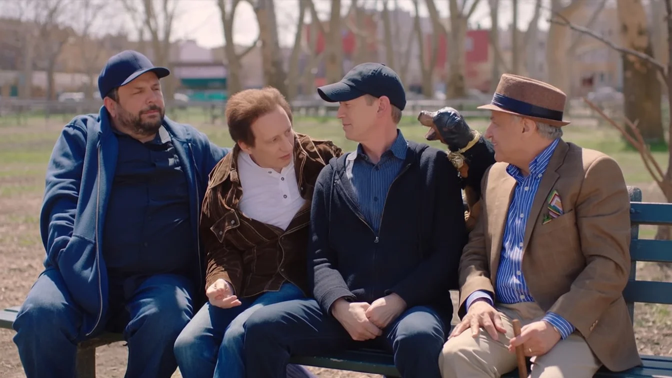 Triumph the Insult Comic Dog yapped at his host (center) to kick off the second season of Park Bench With Steve Buscemi, with (from left) Geo Orlando, Steve’s brother Michael Buscemi and Anthony Laciura.