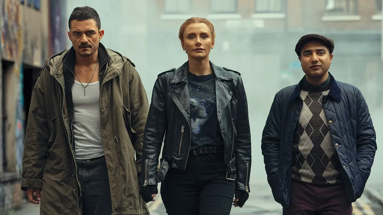From left: Orlando Bloom, Bryce Dallas Howard and Nick Mohammed in Amazon Prime Video’s Deep Cover.